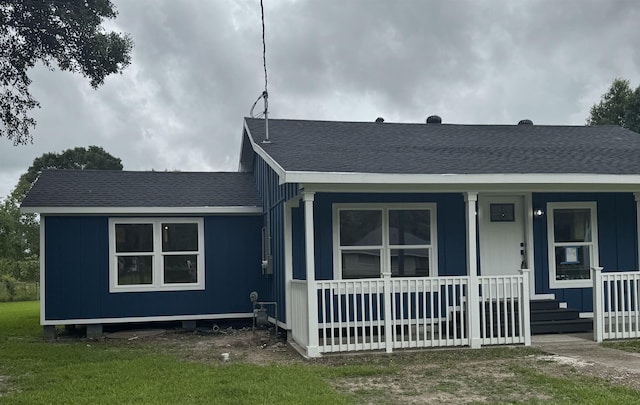 3128 58th St, Port Arthur, TX 77640 - bungalow featuring roof with shingles and covered porch