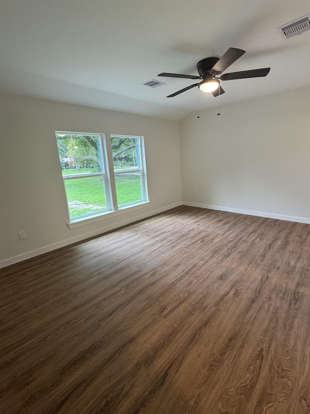 3128 58th St, Port Arthur, TX 77640 - spare room with dark wood-style flooring and ceiling fan