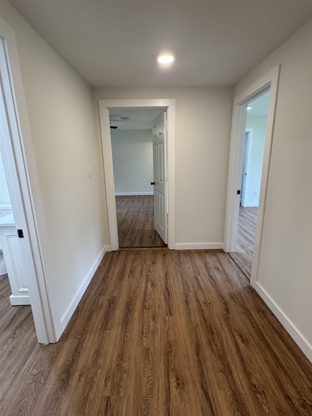 3128 58th St, Port Arthur, TX 77640 - corridor featuring dark wood-style flooring and recessed lighting