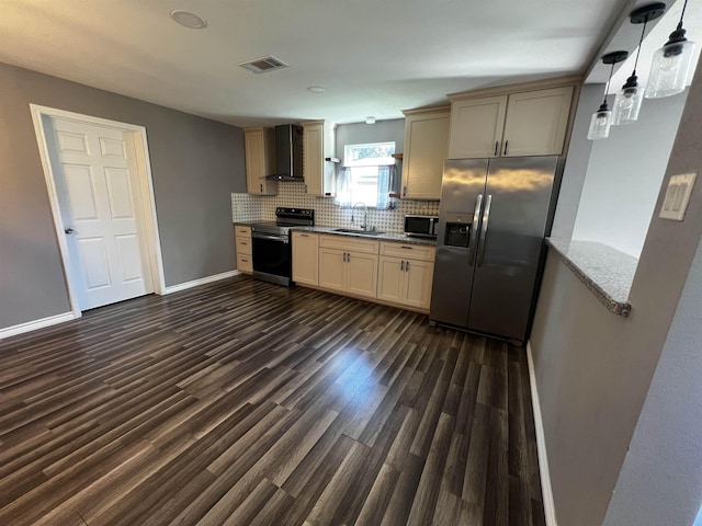 kitchen featuring stainless steel fridge, backsplash, wall chimney range hood, sink, and black electric range