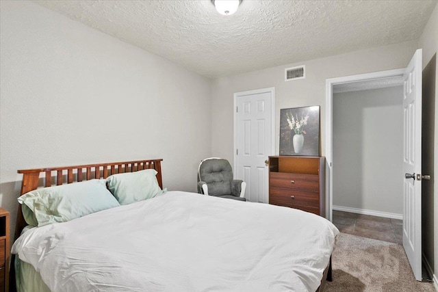 bedroom with a textured ceiling