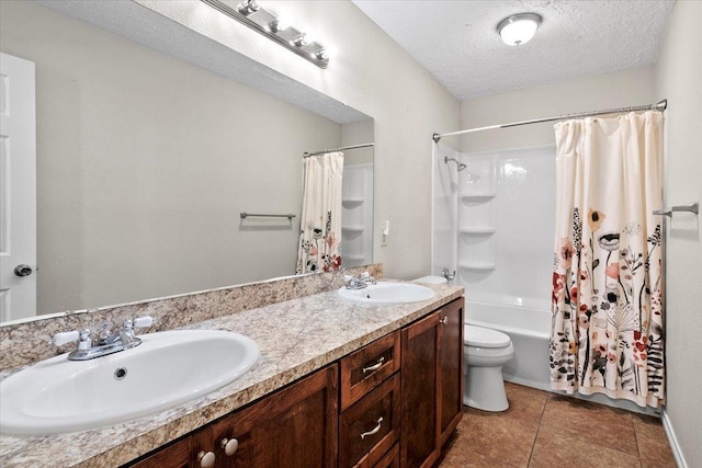 full bathroom with shower / tub combo, vanity, a textured ceiling, tile patterned flooring, and toilet