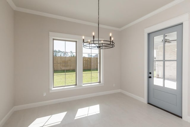 unfurnished dining area with crown molding and a chandelier