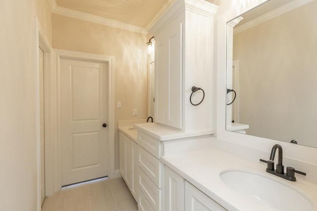 bathroom featuring vanity, ornamental molding, and tile patterned floors