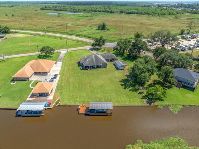 bird's eye view featuring a water view and a rural view