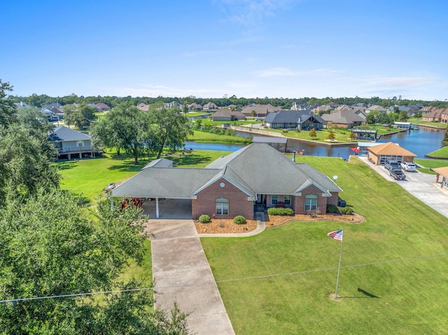 birds eye view of property featuring a water view