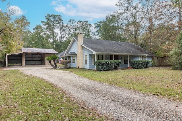 ranch-style home with a front yard and a carport