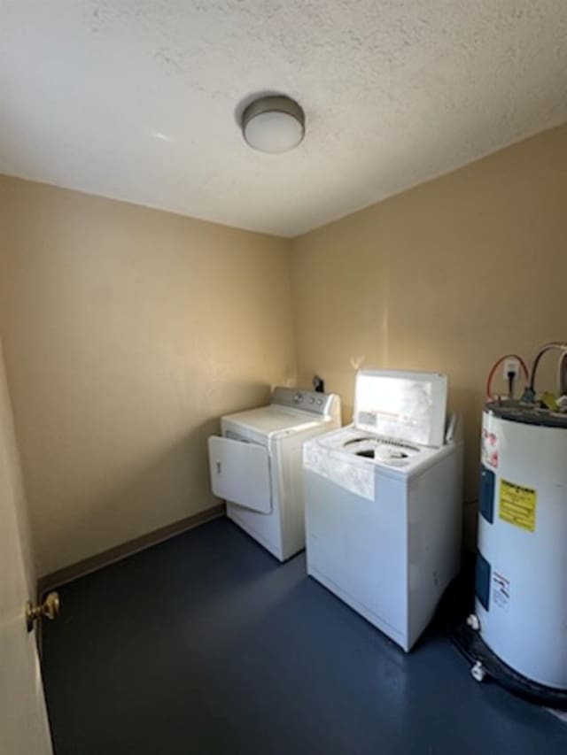 301 W Lavielle, Kirbyville, TX 75956 - washroom featuring water heater, washing machine and clothes dryer, and laundry area