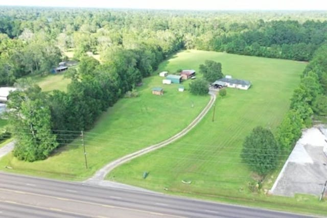 birds eye view of property featuring a rural view