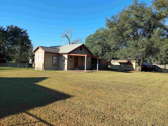 exterior space featuring a lawn