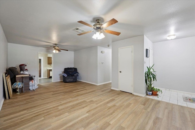 9385 Glen Mdw, Beaumont, TX 77706 - unfurnished room with light wood-style flooring and ceiling fan