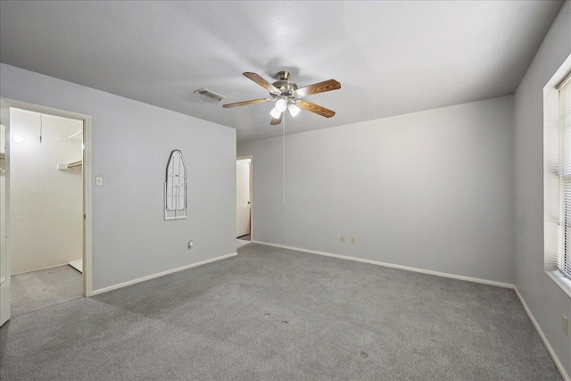 9385 Glen Mdw, Beaumont, TX 77706 - unfurnished room featuring ceiling fan and carpet floors