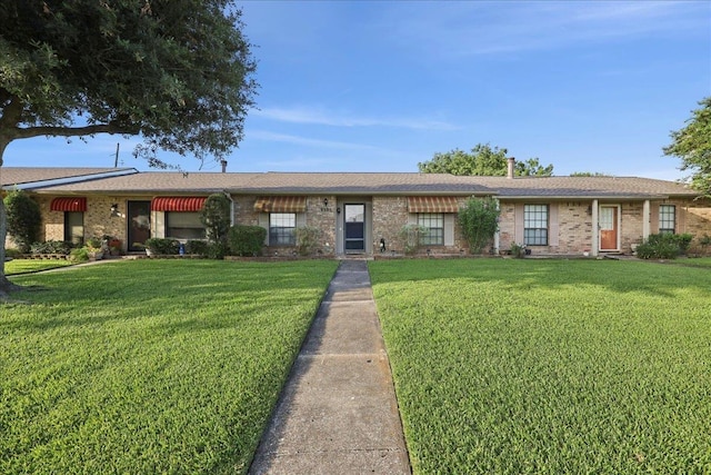 9385 Glen Mdw, Beaumont, TX 77706 - single story home with a front lawn and brick siding