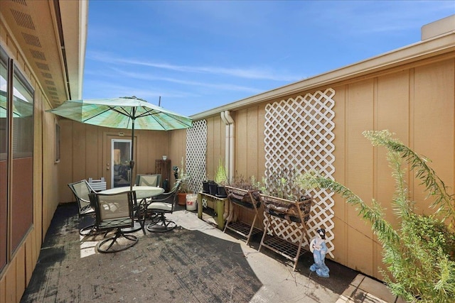 9385 Glen Mdw, Beaumont, TX 77706 - view of patio with outdoor dining space
