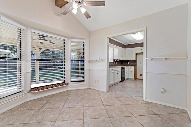 unfurnished dining area with a healthy amount of sunlight, ceiling fan, and light tile patterned floors