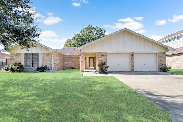 single story home featuring concrete driveway, brick siding, a front yard, and a garage