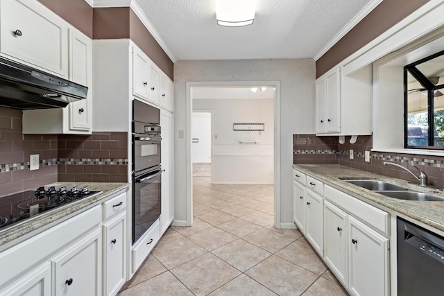 kitchen featuring black appliances, range hood, a sink, and white cabinets
