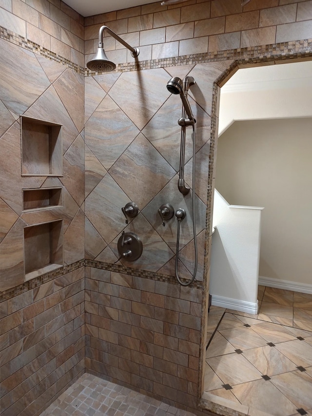 bathroom featuring a tile shower