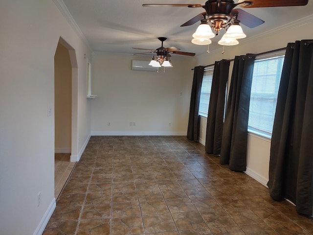 spare room featuring crown molding and a wall mounted air conditioner