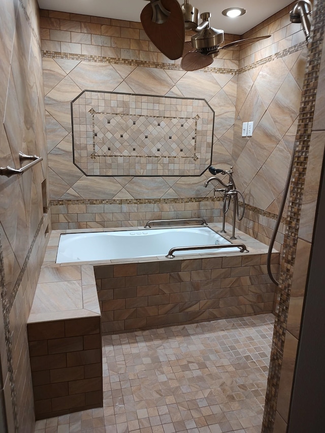 bathroom with tiled shower / bath combo and tile walls