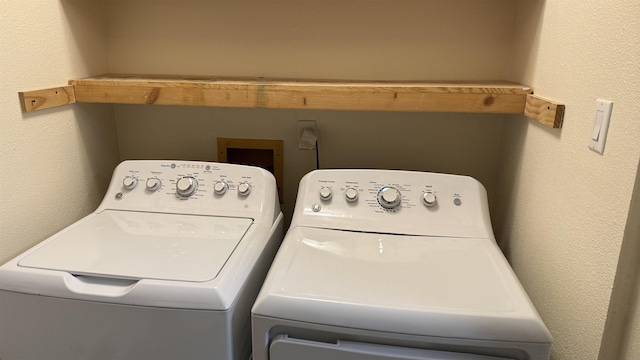 washroom featuring separate washer and dryer