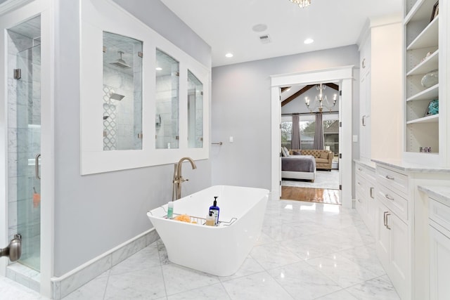 bathroom featuring ensuite bathroom, baseboards, marble finish floor, a shower stall, and an inviting chandelier