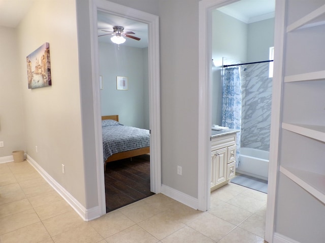 4261 Carlene Dr, Orangefield, TX 77630 - hall with light tile patterned floors, baseboards, and crown molding