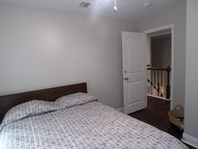 4261 Carlene Dr, Orangefield, TX 77630 - bedroom featuring baseboards and wood finished floors