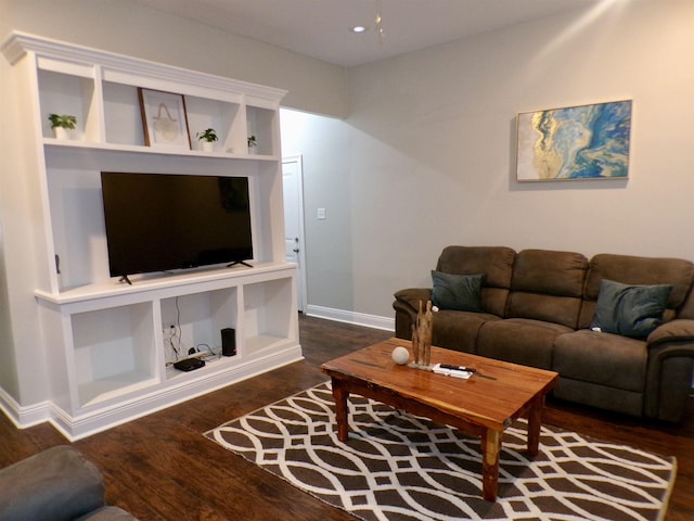 4261 Carlene Dr, Orangefield, TX 77630 - living room with dark wood-type flooring, baseboards, and recessed lighting