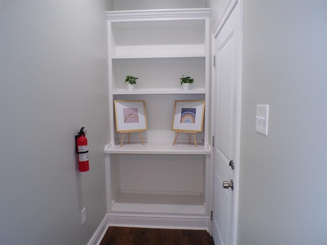 4261 Carlene Dr, Orangefield, TX 77630 - detailed view of a fire extinguisher and wood finished floors