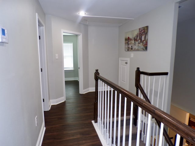 4261 Carlene Dr, Orangefield, TX 77630 - hallway featuring an upstairs landing, dark wood-style floors, baseboards, and attic access