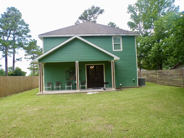 4261 Carlene Dr, Orangefield, TX 77630 - back of property featuring central air condition unit and a patio