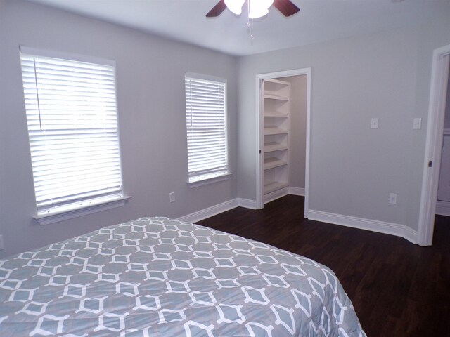 4261 Carlene Dr, Orangefield, TX 77630 - bedroom with dark wood-type flooring, baseboards, and a ceiling fan