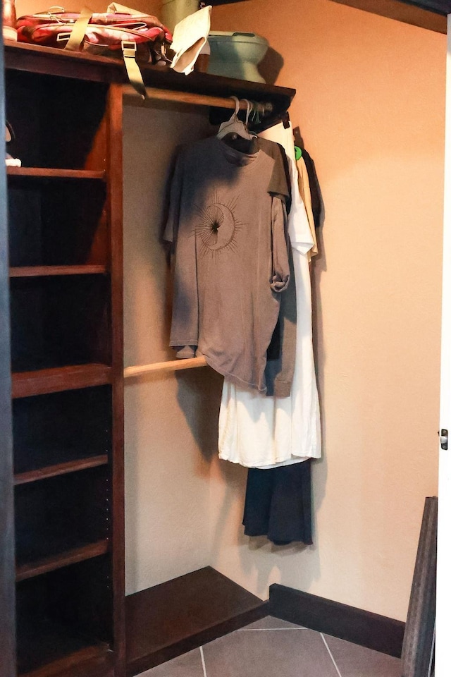 1620 Wellington Pl, Beaumont, TX 77706 - walk in closet featuring tile patterned floors