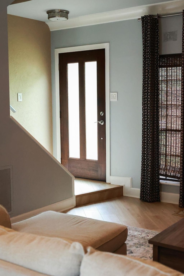 1620 Wellington Pl, Beaumont, TX 77706 - entryway with wood finished floors and ornamental molding