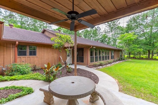 exterior space with a ceiling fan