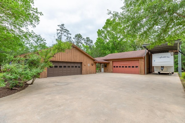 single story home featuring an attached garage and driveway