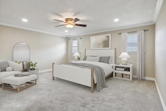 bedroom with ceiling fan, light colored carpet, and crown molding