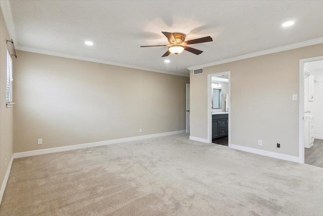 unfurnished bedroom featuring carpet flooring, connected bathroom, crown molding, and ceiling fan