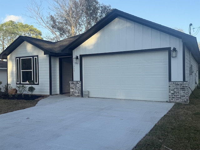 ranch-style home featuring a garage