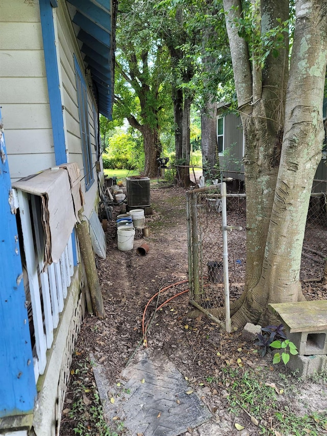 view of yard with central AC