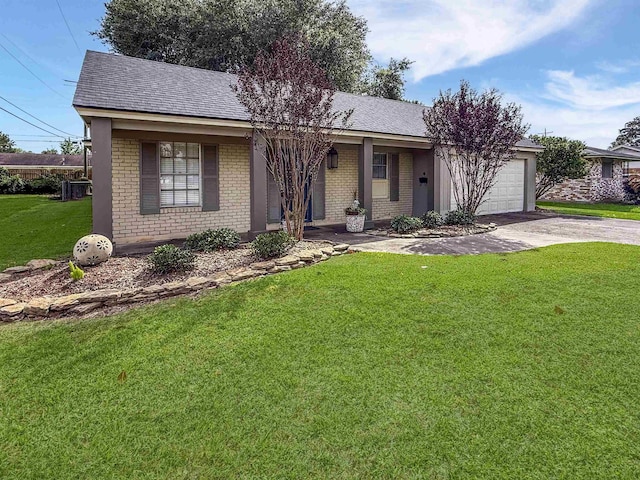 6215 Westgate Dr, Beaumont, TX 77706 - ranch-style house featuring concrete driveway, brick siding, an attached garage, and a front lawn
