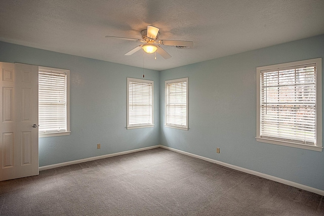 6215 Westgate Dr, Beaumont, TX 77706 - carpeted spare room featuring a ceiling fan, plenty of natural light, and baseboards