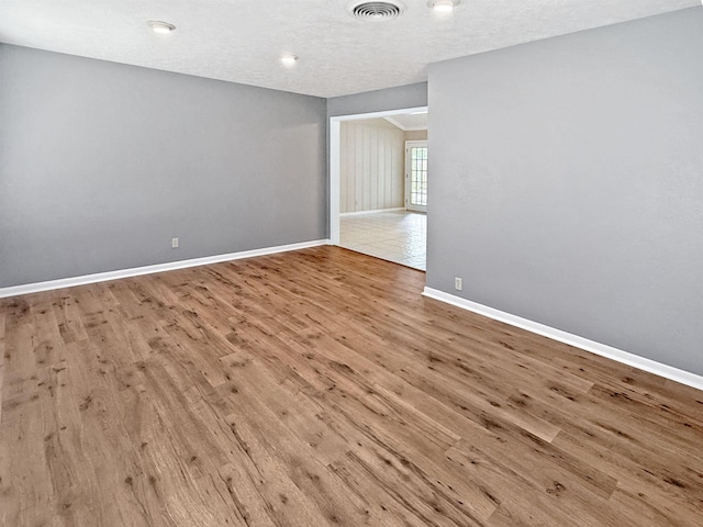 6215 Westgate Dr, Beaumont, TX 77706 - spare room with wood finished floors and baseboards