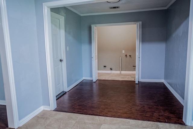 hallway featuring light wood-type flooring and crown molding