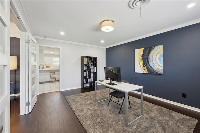 office space featuring ornamental molding, wood-type flooring, recessed lighting, and baseboards