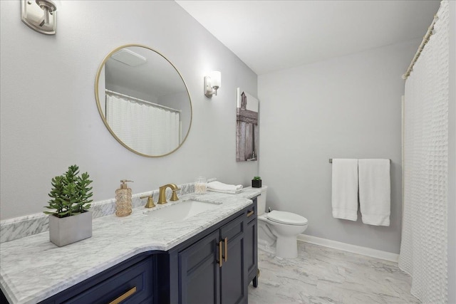 bathroom featuring marble look tiles, vanity, and toilet