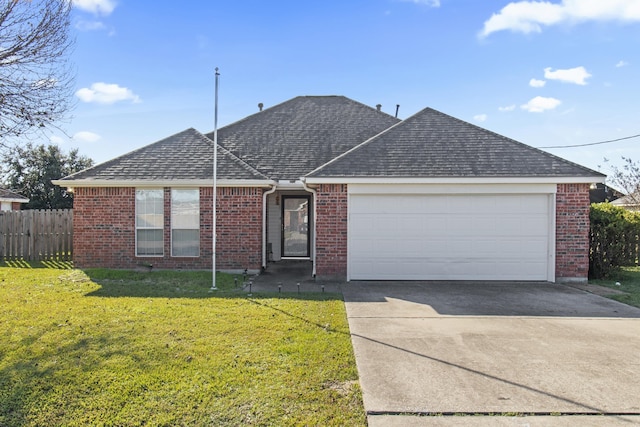 ranch-style home featuring a front yard and a garage