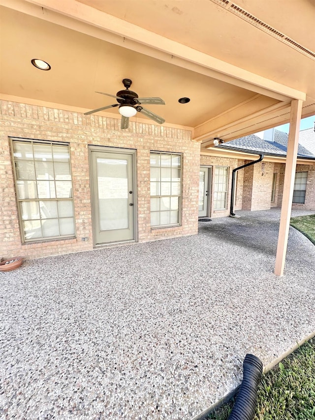 view of patio / terrace featuring ceiling fan