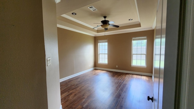 unfurnished room with a ceiling fan, crown molding, a textured wall, and a tray ceiling